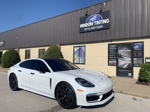 Tinted sedan parked outside A1 Window Tint Olathe Kansas